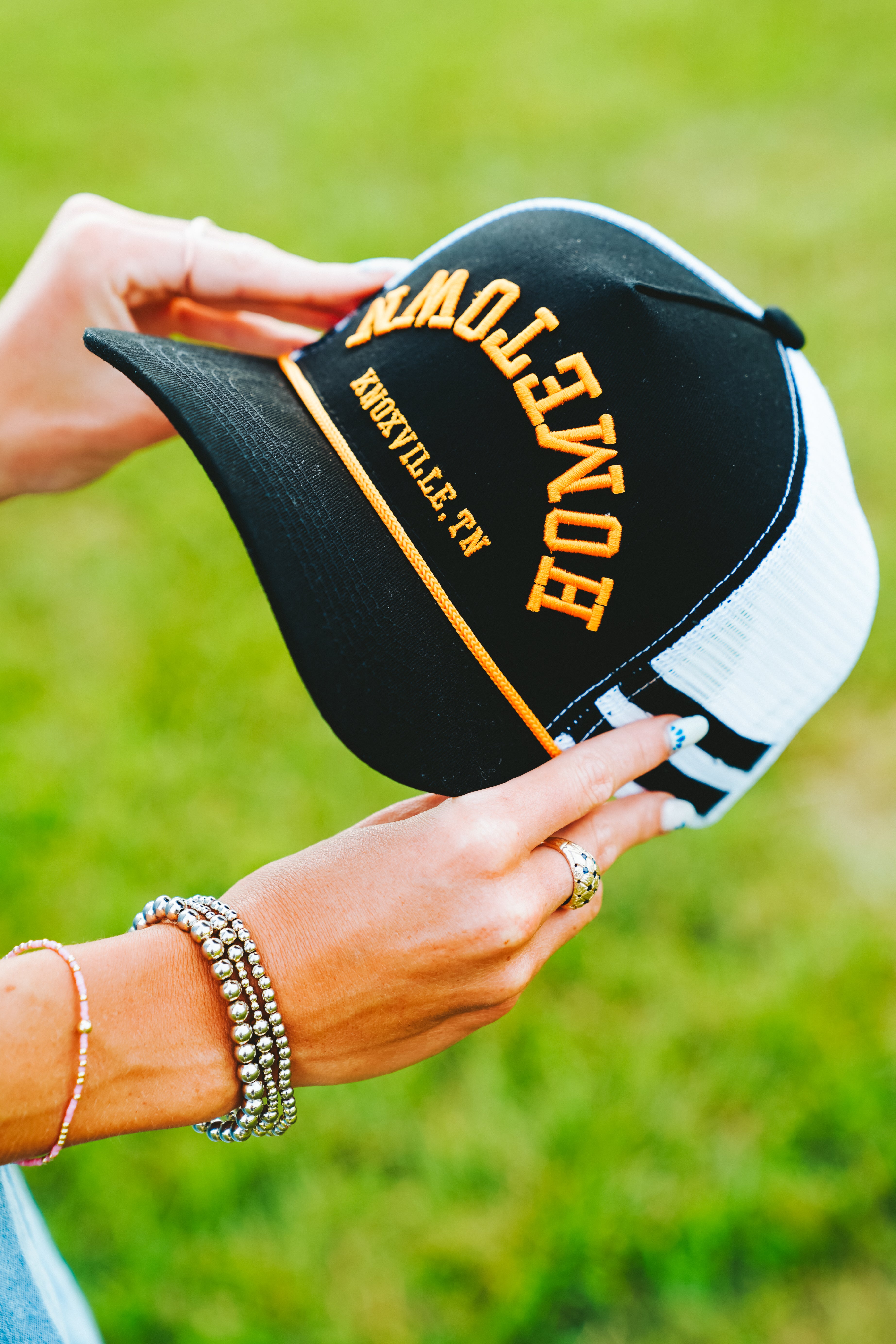 Black Upside Down Hometown Knoxville Hat with white mesh back on display.
