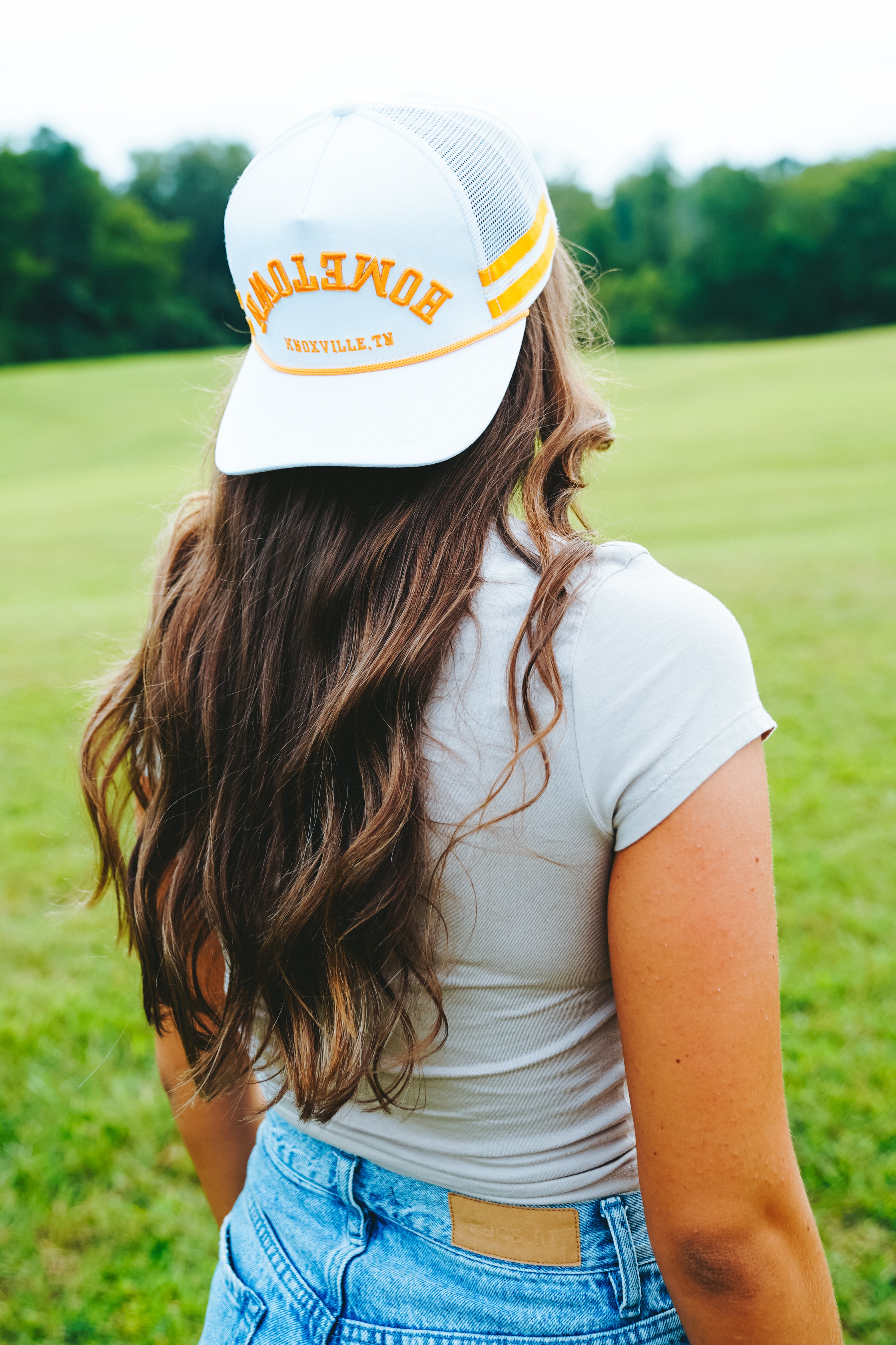 White Upside Down Hometown Knoxville Hat with orange accents, front view.