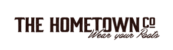 Logo of The Hometown Co with tagline 'Wear your Roots' on a white background