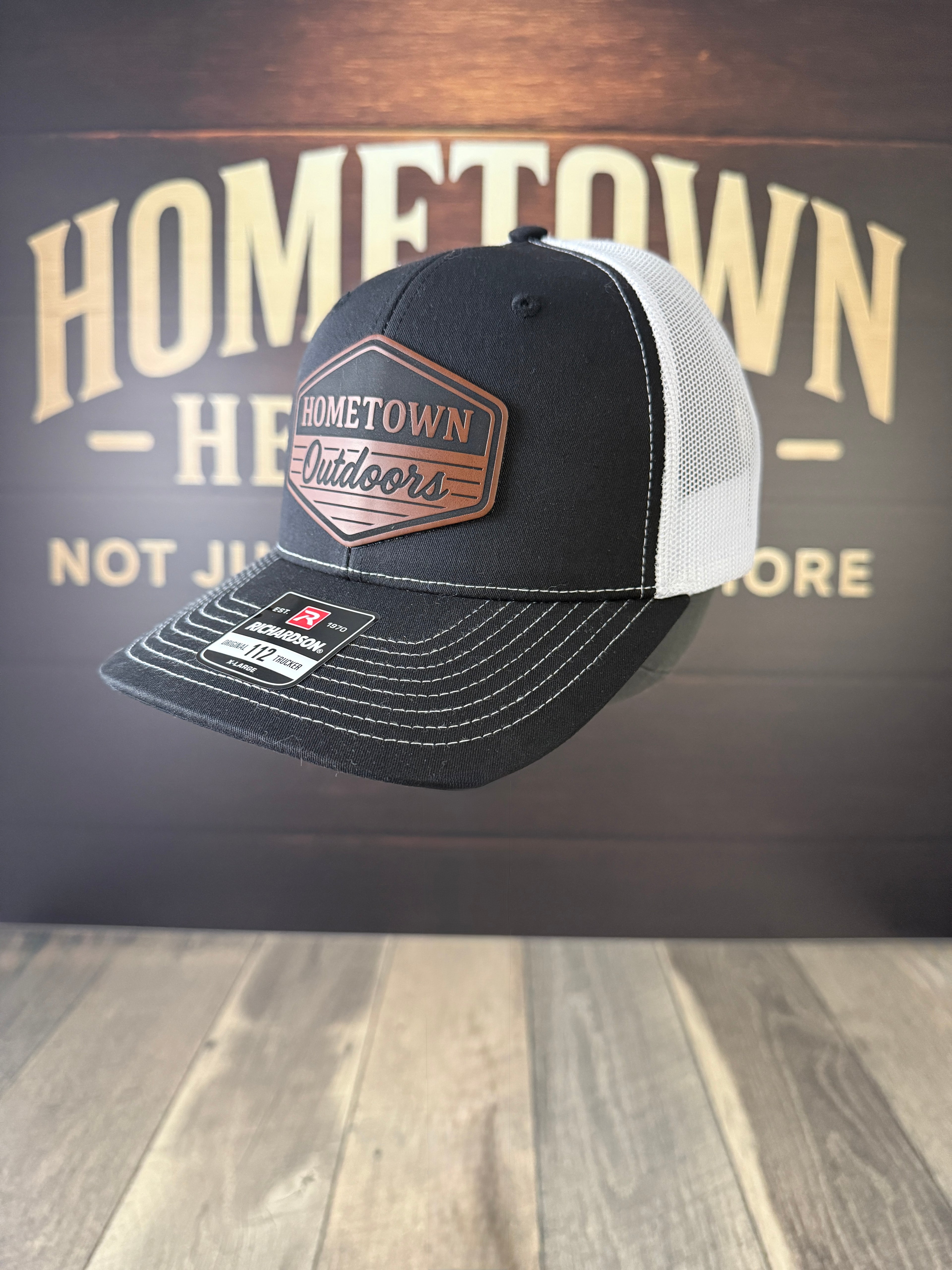 Walnut to Black Signature Leatherette, 12" x 24", 1.8 mm thick, displayed flat.