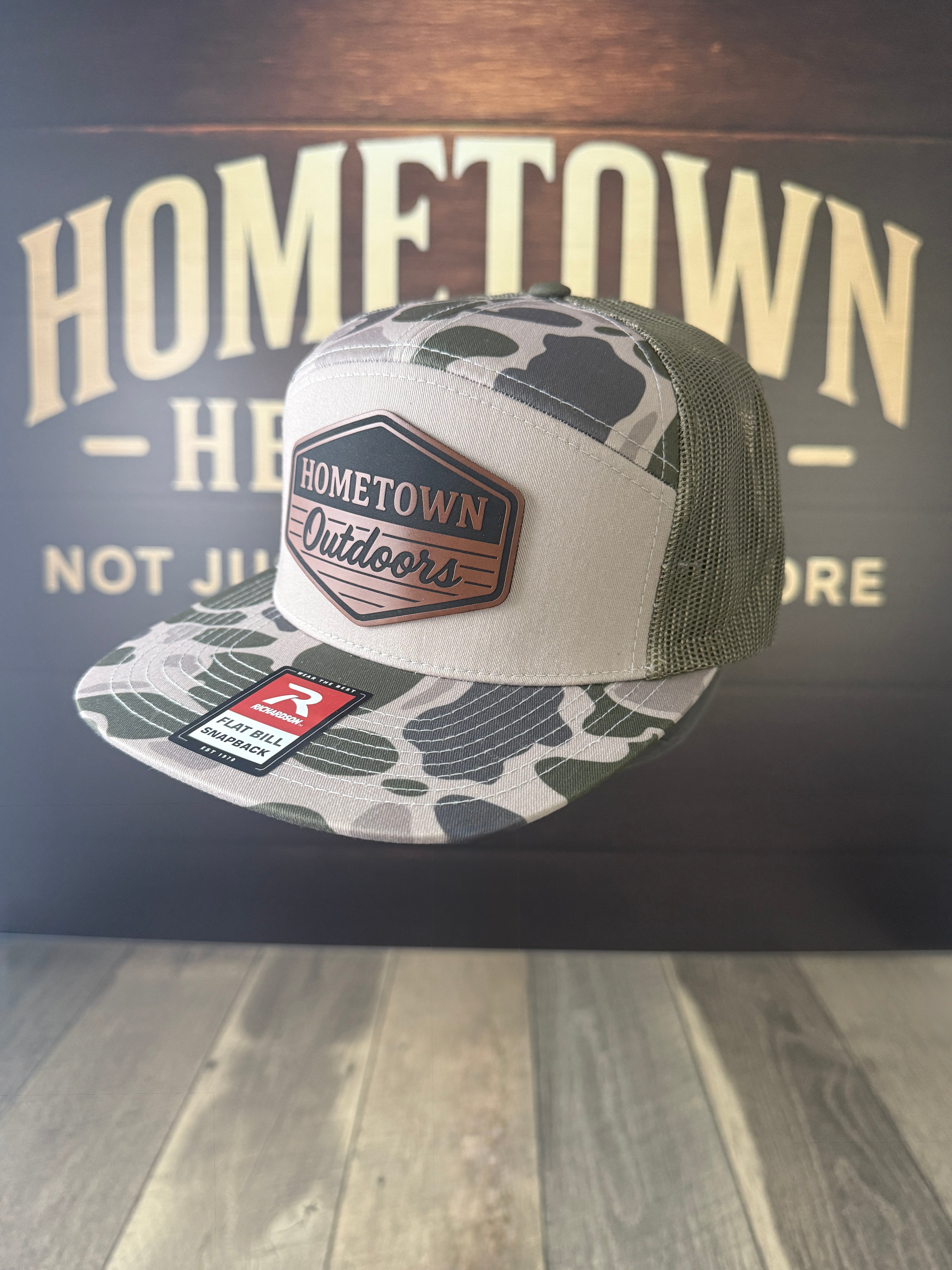 Signature Leatherette in Walnut to Black, 12"×24", ~1.8 mm thick, displayed outdoors.