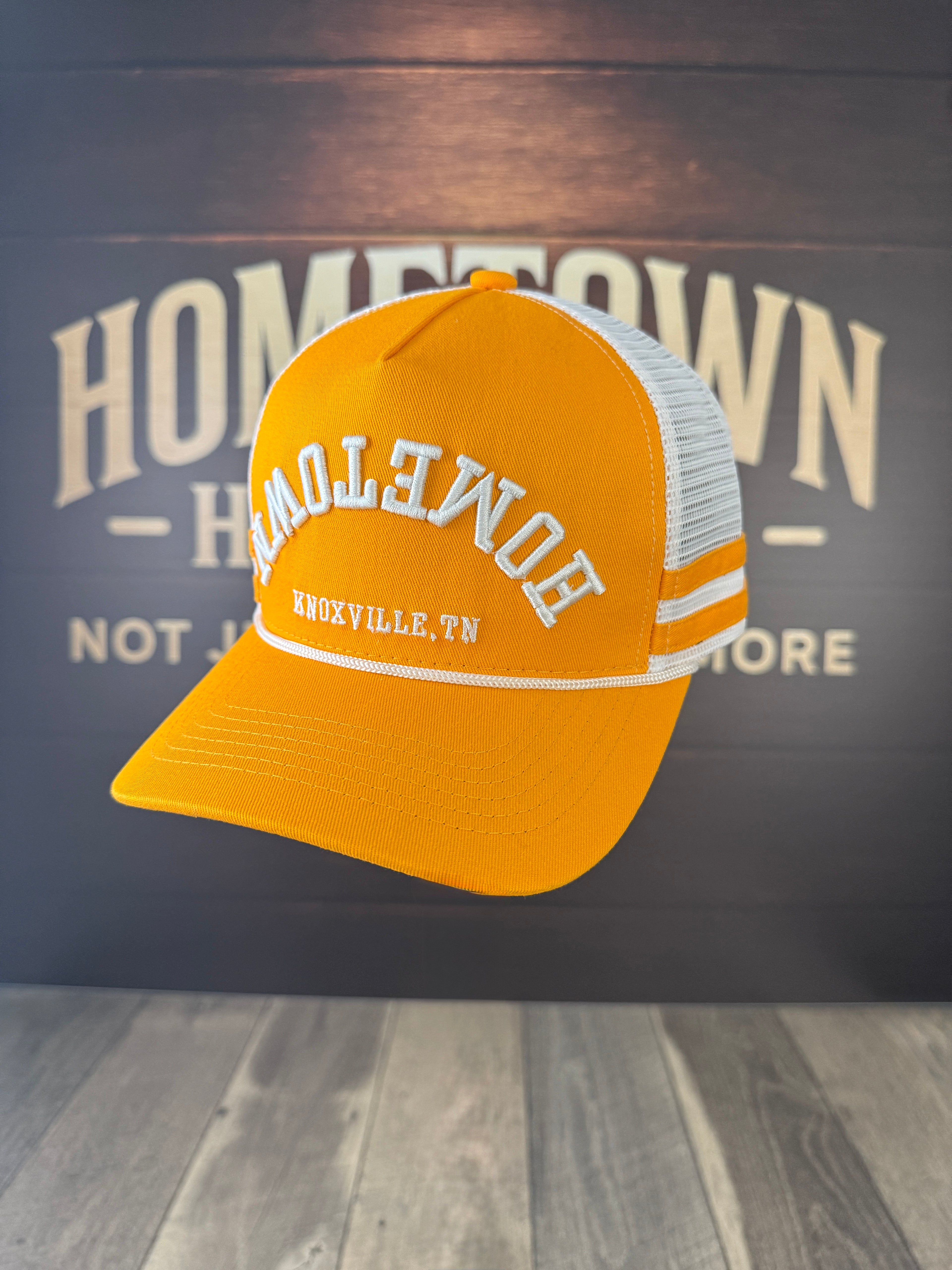 Upside Down Hometown Knoxville Hat in orange, white mesh back, front view.